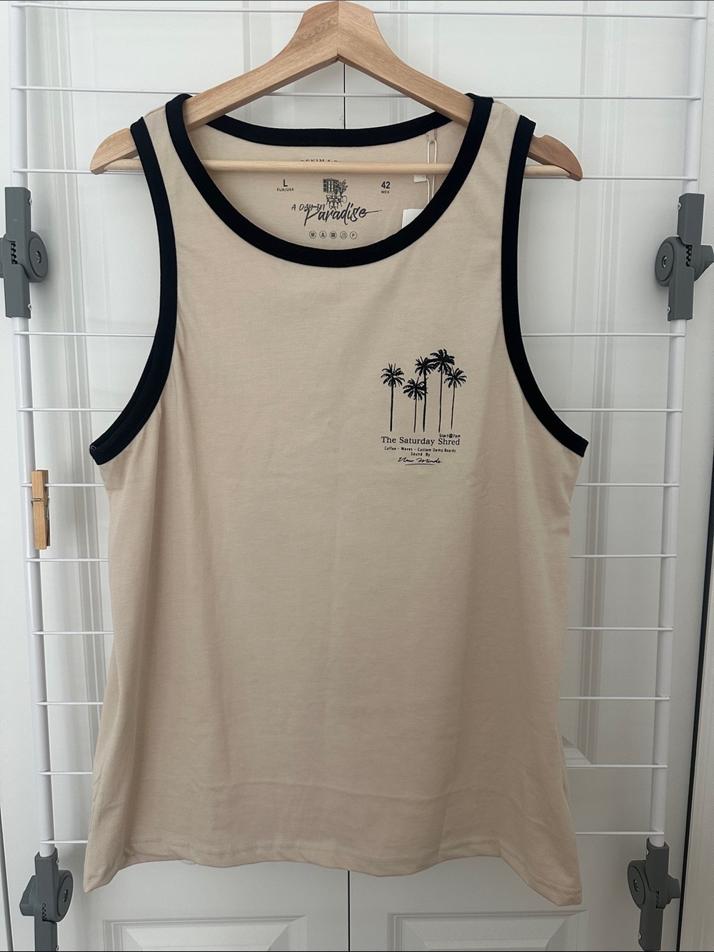 Denim & Flower Beige Tee with Black Neck Trim - 'A Day in Paradise' Print